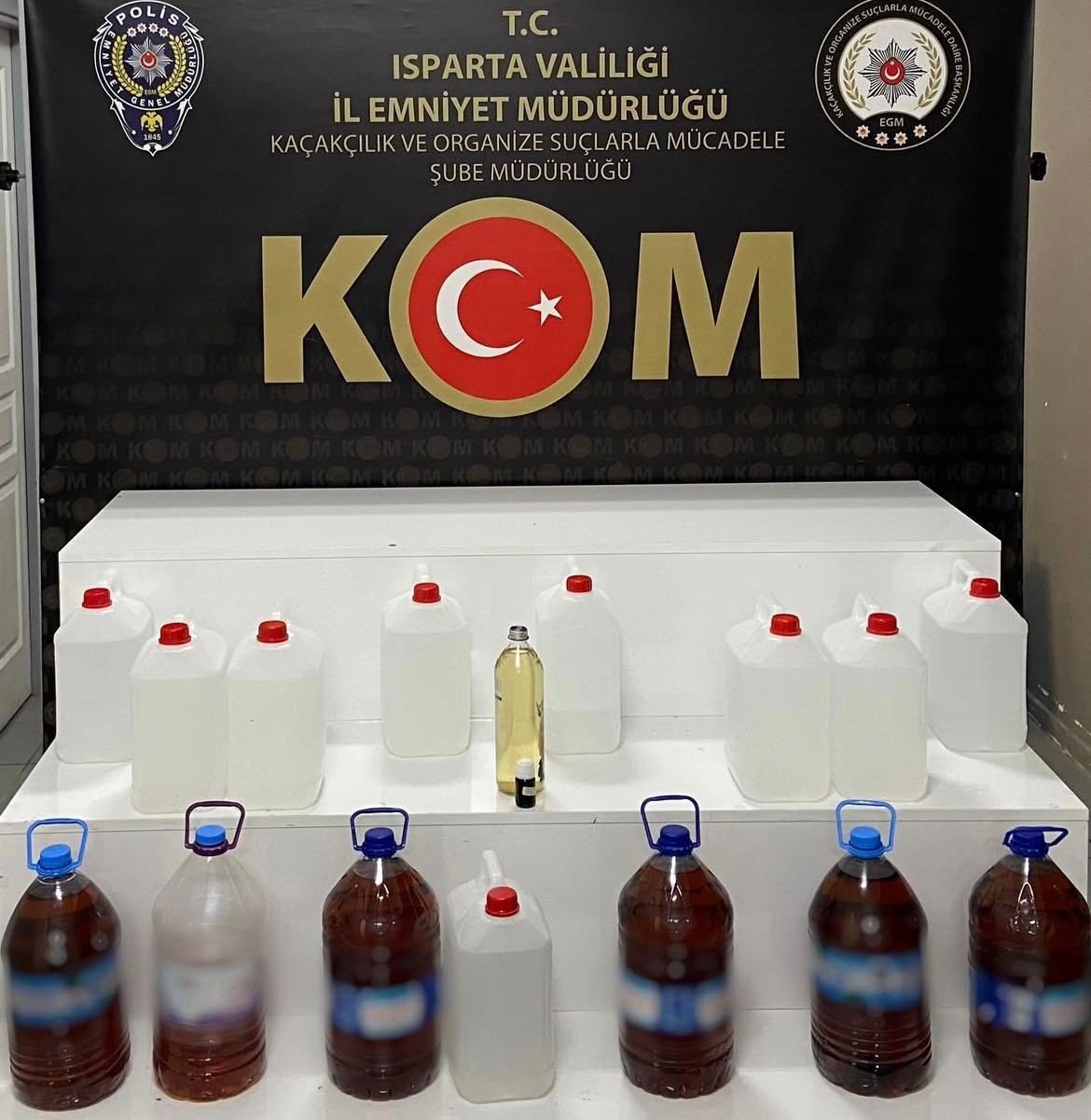 ispartada-kacak-alkol-operasyonu-69-litre-sahte-icki-ele-gecirildi