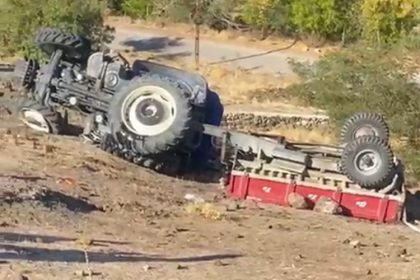 baba-ogul-devrilen-traktorde-agir-yaralandi