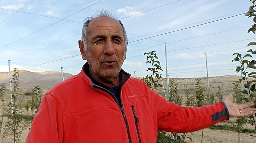 ilcede-yetisen-elma-hayatina-yon-verdi-harclikla-basladi-100-donumluk-araziye-5-bin-fidan-dikti